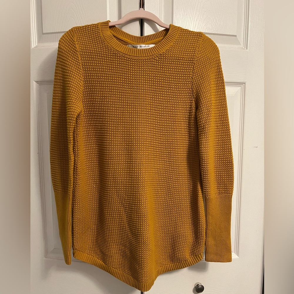 Mustard Sweater with button detail on back. Size Medium.